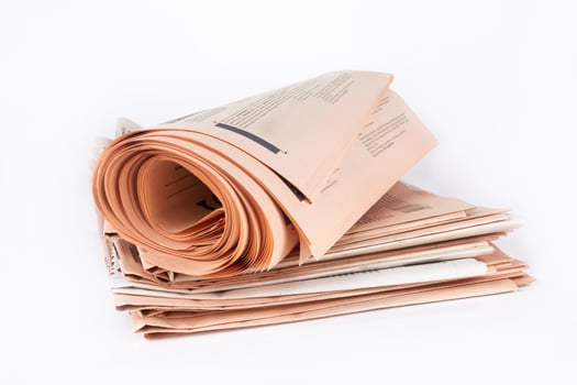 newspapers on white photo
