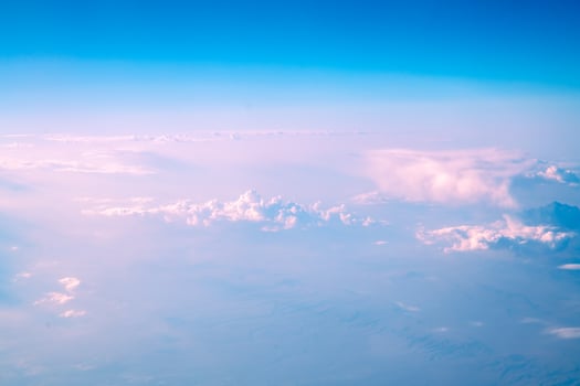 view of beautiful pink clouds in the sky, natural background, view from plane, top view photo