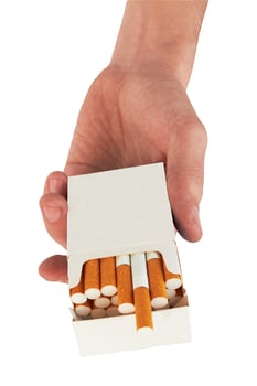 cigarettes in hand photo