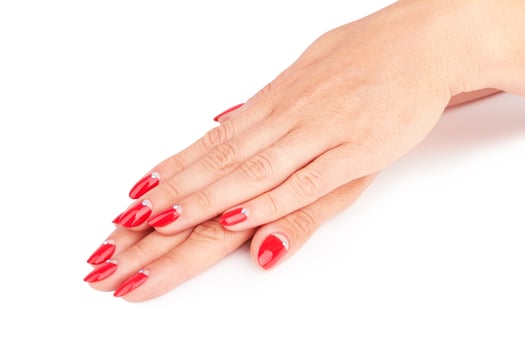 red manicure on white photo