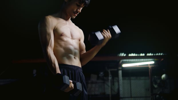 Dumbbell exercise, weight lifting and muscle building, healthy activities photo