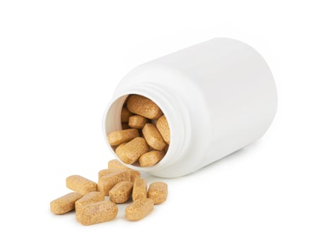 Pills vitamins on white photo