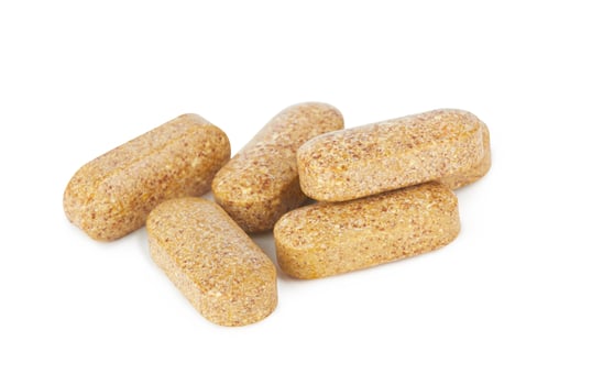 Pills vitamins on white photo
