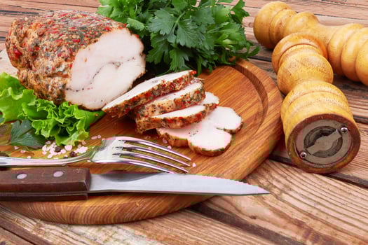 Baked meat on wooden surface photo