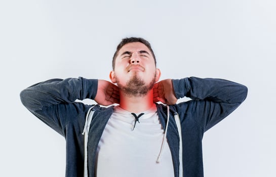 Sore person with neck pain isolated. Neck pain and stress concept photo