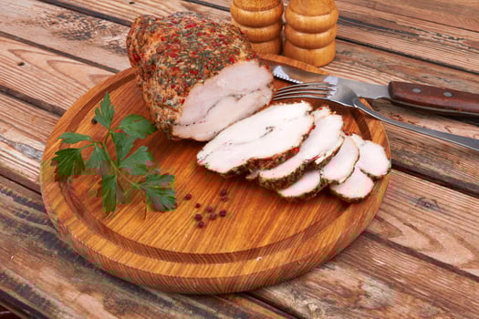 Baked meat on wooden surface photo