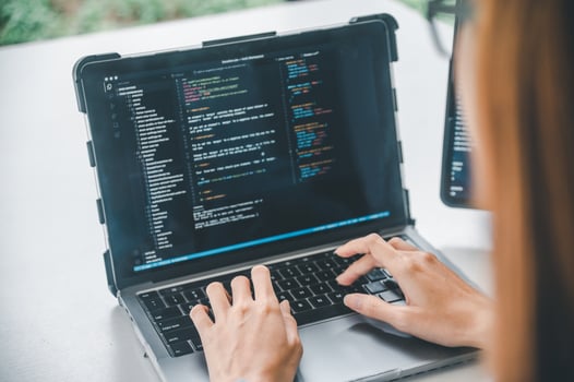 Female programmer working on coding, software development and web design.Concept technology development. photo