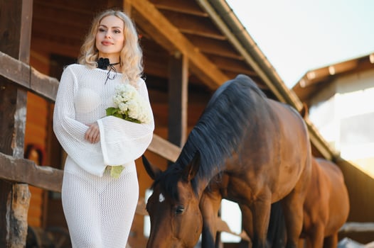 young woman in a dress with a horse photo