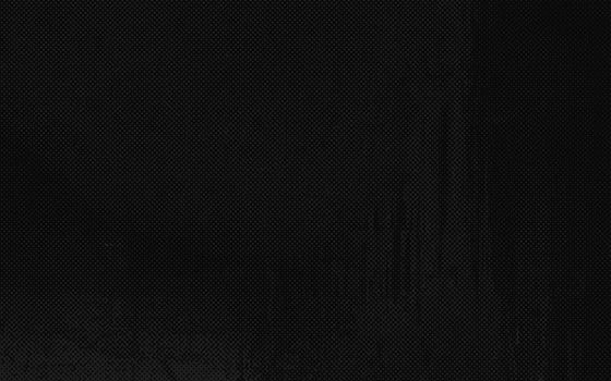 Grunge halftone black gradient background. Rough faded grit dark grey noise grain texture sand wallpaper. Retro pixelated backdrop. Anime or manga style comic graphic design illustration. photo
