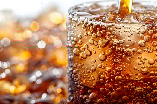 Refreshing Cold Fizzy Cola Drink with Bubbles Close-Up - Beverage Texture for Refreshment Design photo