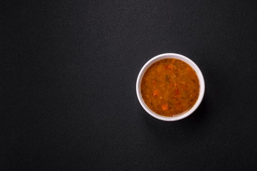 Delicious hot tomato soup with vegetables, vegan, vegetarian food photo