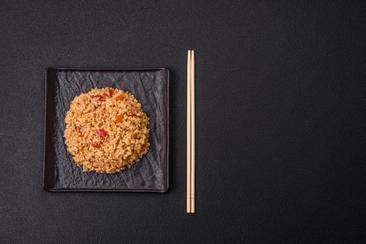 Delicious hot boiled wheat porridge couscous with vegetables a photo