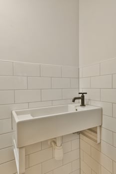 A bathroom with a sink and a toilet in it photo