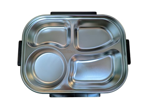 Top view of a stainless steel SUS304 food container with four compartments on a neutral background. Safe and durable for food storage photo