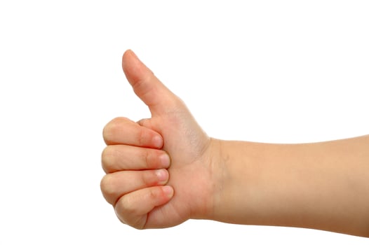 Thump up on a white background photo