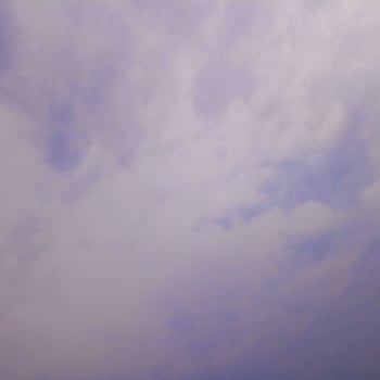 Bright Azure Skies Interspersed with Soft Clouds photo