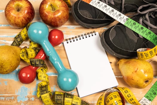 fruit for weight loss with measuring tape and equipment for exercise and diet, weight loss photo