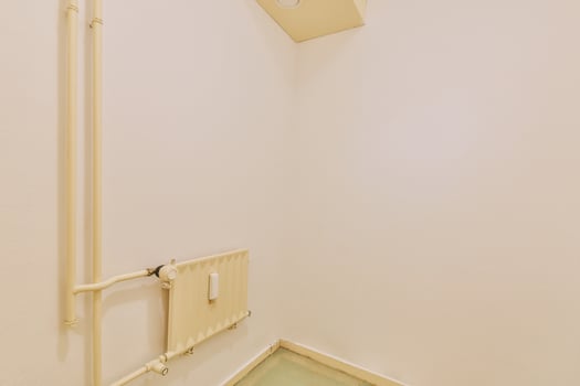 A bathroom with a toilet and a sink photo
