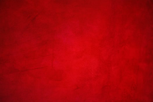 Dark red matte background of suede fabric. photo