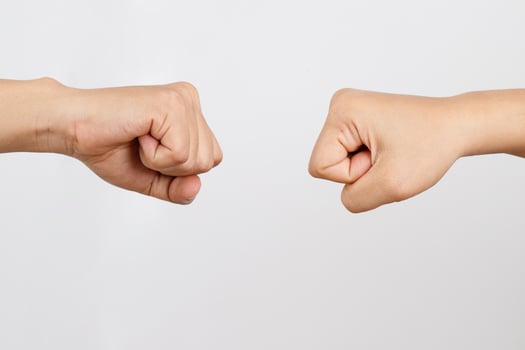 Concept hands of two men pumping is trade competitor symbol photo
