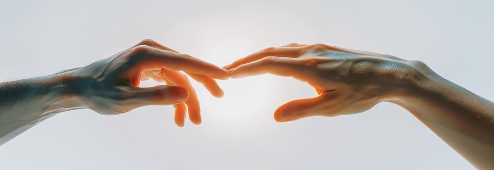 Two hands reaching towards each other in a soft light. Concept of human connection, support, unity, and empathy photo
