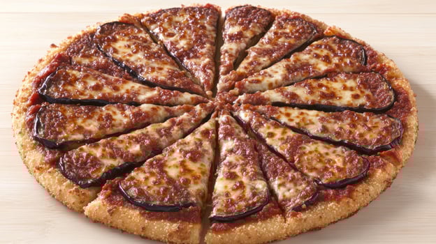 Deliciously baked pizza showcasing a golden brown crust and generous toppings photo