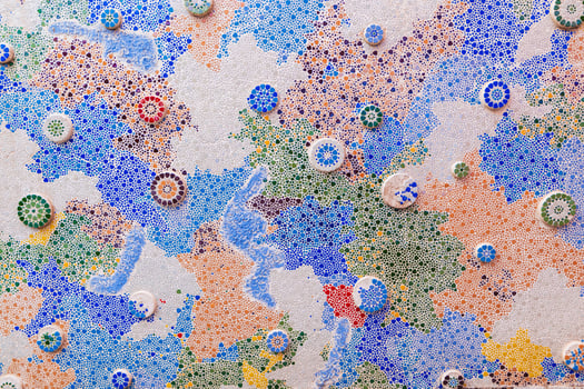 The walls are decorated with colorful tiles and beads. photo