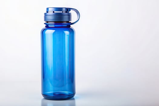 Blue reusable water bottle with secure lid on white background, blue, white background, secure lid, hydration, eye level, eco friendly photo