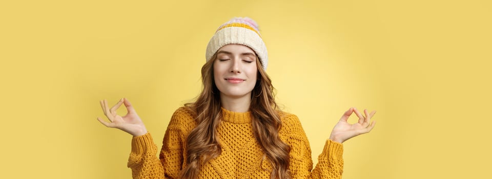 Keep calm carry on. Portrait relieved happy meditating charming young woman learn control feelings breething yoga practice smiling delighted relaxed close eyes hands sideways zen nirvana gesture photo
