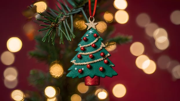 Festive Christmas Tree Ornament with Bokeh Lights photo