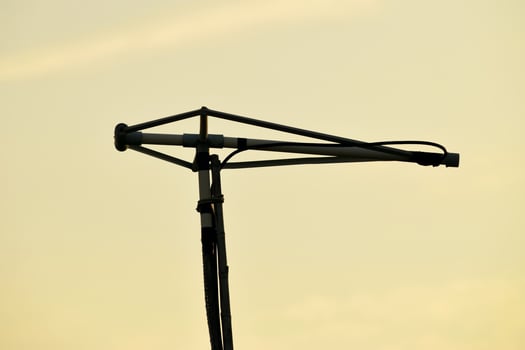 The TV antenna uses a paralon pipe installed on the roof top photo