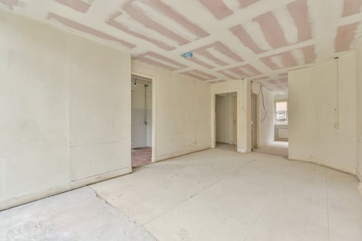 A room with a ceiling that is being painted photo
