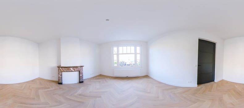 360 - view of a room with a fireplace and wooden floor photo