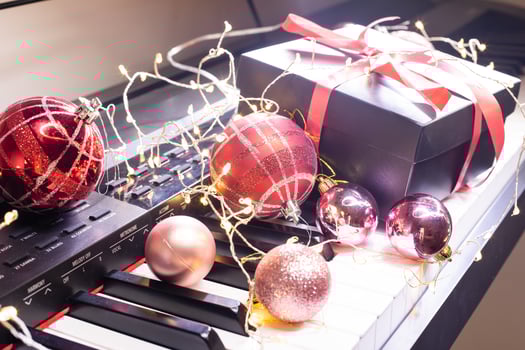 Piano keys with Christmas decorations, closeup happy new year photo