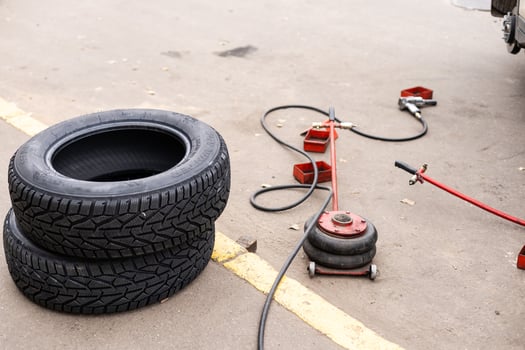 Equipment for car service and repair, tire machine for balancing automotive wheels, balancing stand, closeup photo