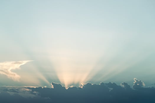 The Sun's Rays over the Clouds photo