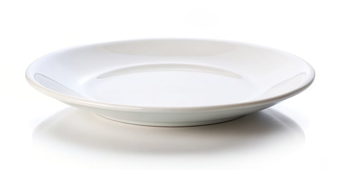 A white bowl on a white surface photo