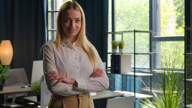 Business portrait smiling confident lady businesswoman entrepreneur happy Caucasian woman girl smile posing with crossed hands at office independent company owner employer female CEO power feminism photo