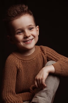 Portrait of happy smiling stylish white caucasian child boy kid preschooler photo