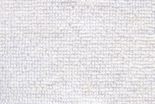 Close-Up of Soft White Towel Fabric Texture Background photo