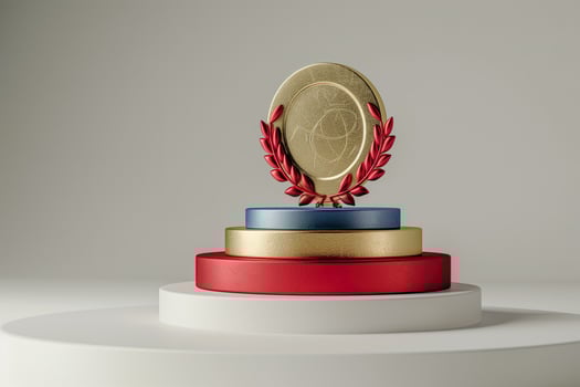 A gold medal on a pedestal with red and blue ribbons photo