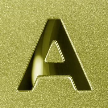 Letter A on a golden grained shiny metal surface. English alphabet. photo