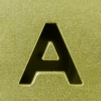 Letter A on a golden grained shiny metal surface. English alphabet. photo