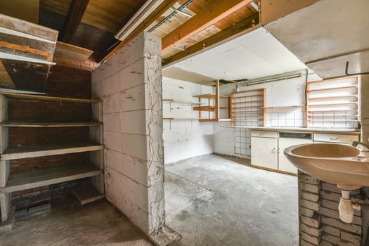 A bathroom with a sink and a shelf photo