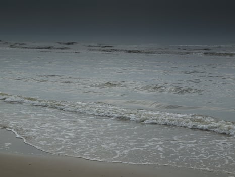waves in egmond at the dutch north sea photo