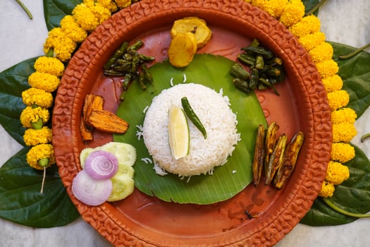 Bengali Cuisine Decorated and Served in earthenware during aiburobhat photo