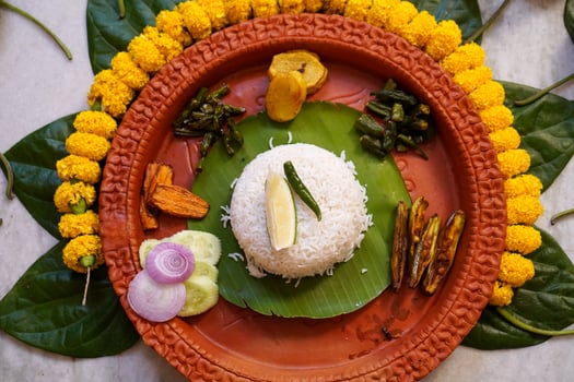 Top View of Bengali Cuisine Decorated and Served in earthenware during aiburobhat photo