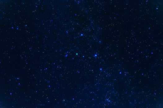 Night starry sky with stars, constellations, nebulae and galaxies at night. Abstract blue background photo