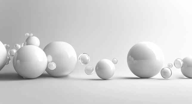 White spheres scattered on a smooth surface in a minimalist interior design setting photo