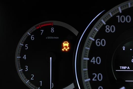 A car traction control system malfunction warning light on the car instrument dashboard , Car repair concept photo